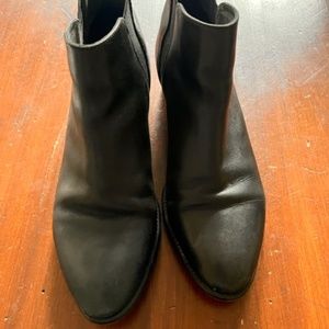 Black leather ankle boots with short heels